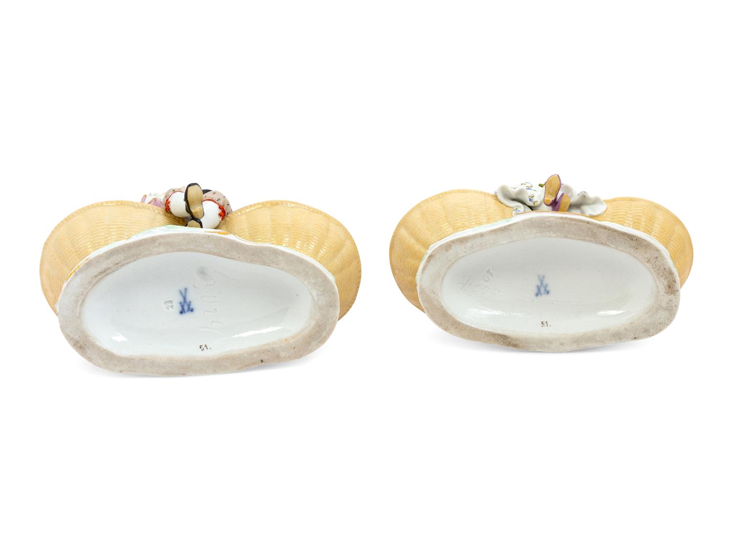 A Pair of Meissen Porcelain Basket Figures