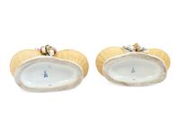 A Pair of Meissen Porcelain Basket Figures