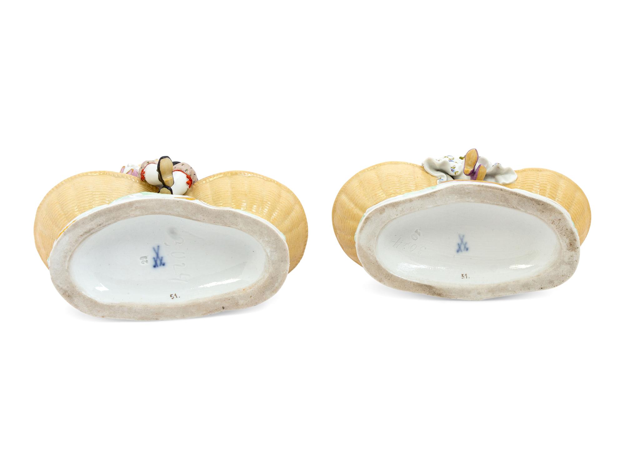 A Pair of Meissen Porcelain Basket Figures
