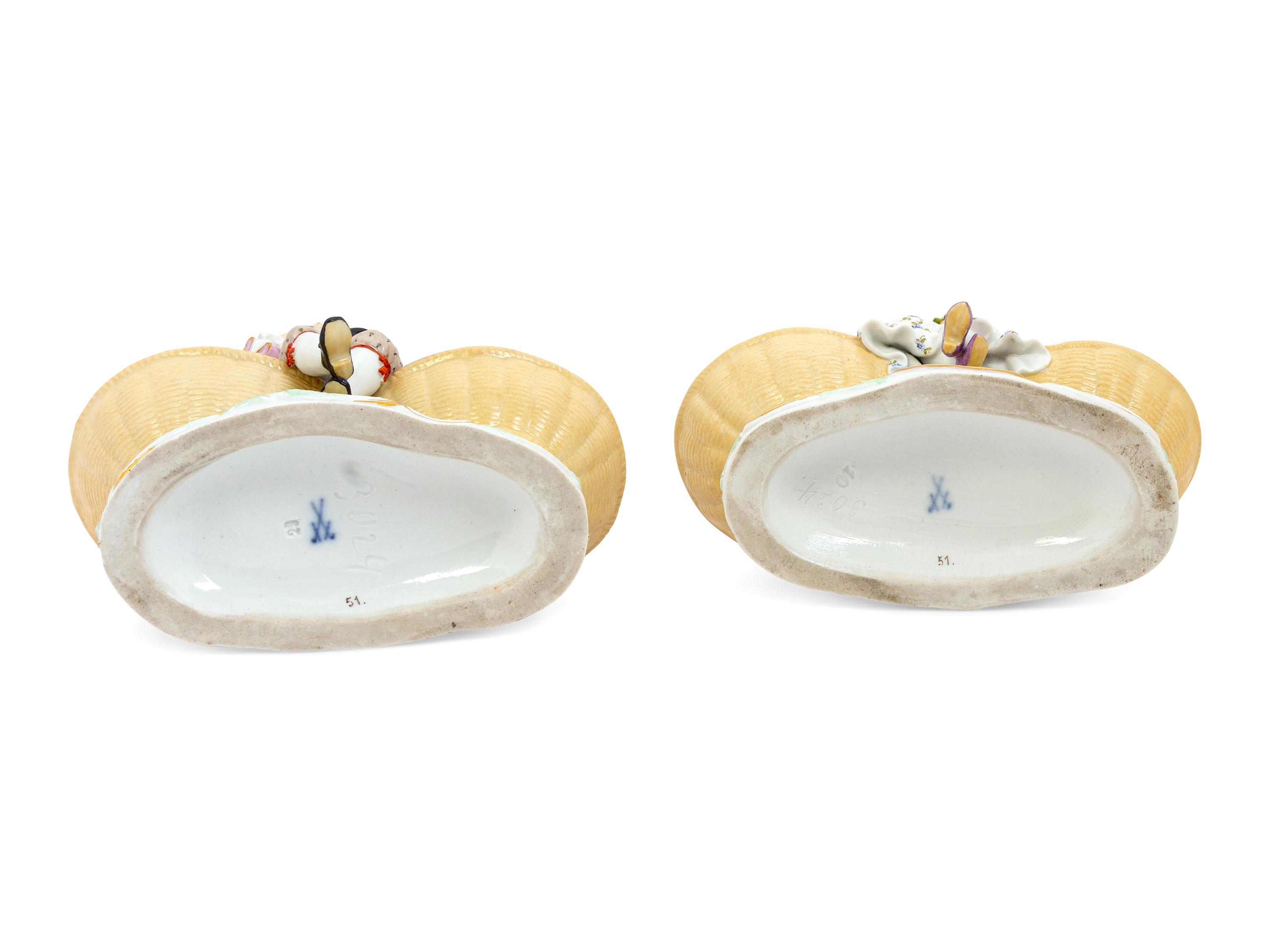 A Pair of Meissen Porcelain Basket Figures