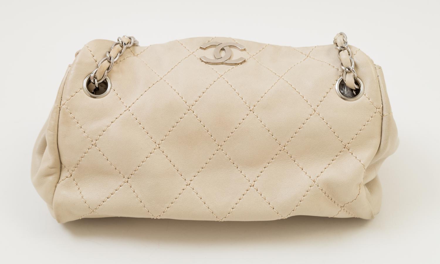 A Chanel Cream Lambskin Quilted Shoulder Bag, 9.5" x 7" x 5.5"; Strap drop: 10".
