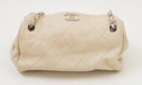 A Chanel Cream Lambskin Quilted Shoulder Bag, 9.5" x 7" x 5.5"; Strap drop: 10".