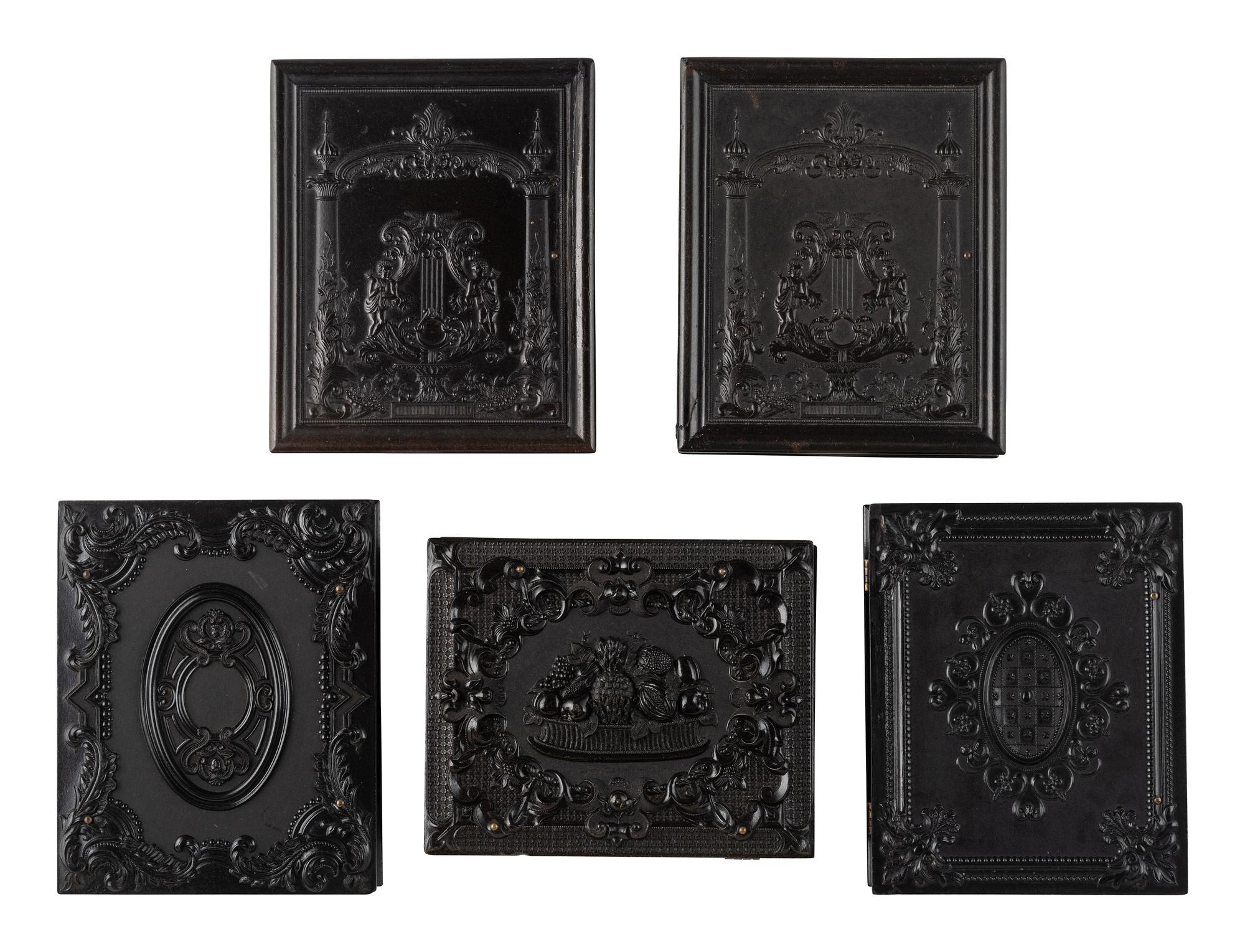 [EARLY PHOTOGRAPHY]. 5 quarter plate Union cases and one Union wall frame, all containing portraits.