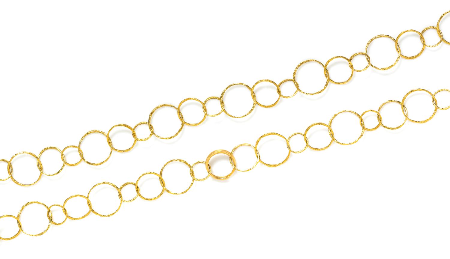 An 18 Karat Yellow Gold Longchain Convertable Necklace, 27.70 dwts.