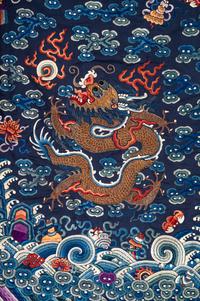 A Blue Ground Embroidered Silk Dragon Robe, Jifu