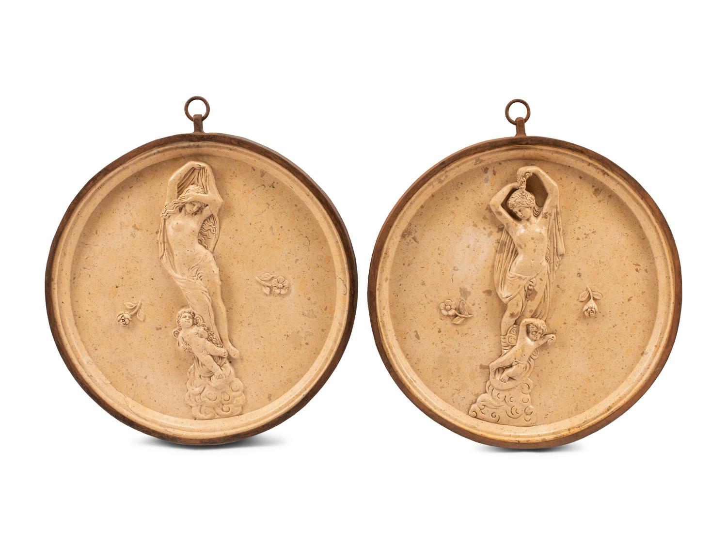 A Pair of Italian Iron-Framed Marble Plaques