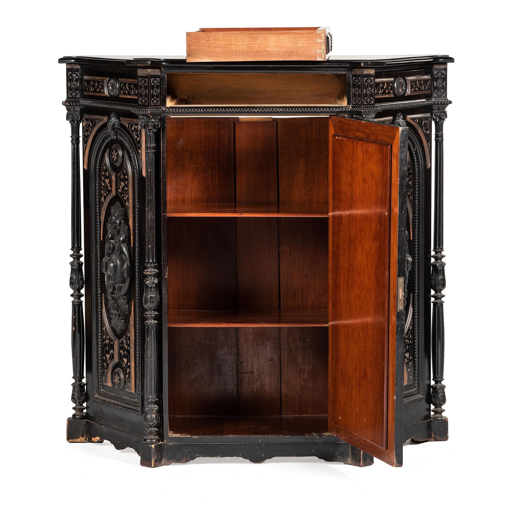 An Aesthetic Movement Parcel Gilt Ebonized Cabinet