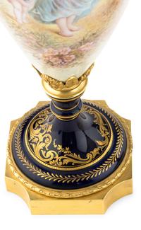 A Pair of Gilt Bronze Mounted Sèvres Style Porcelain Urns