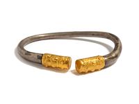 A Celtic Silver and Gold Bracelet