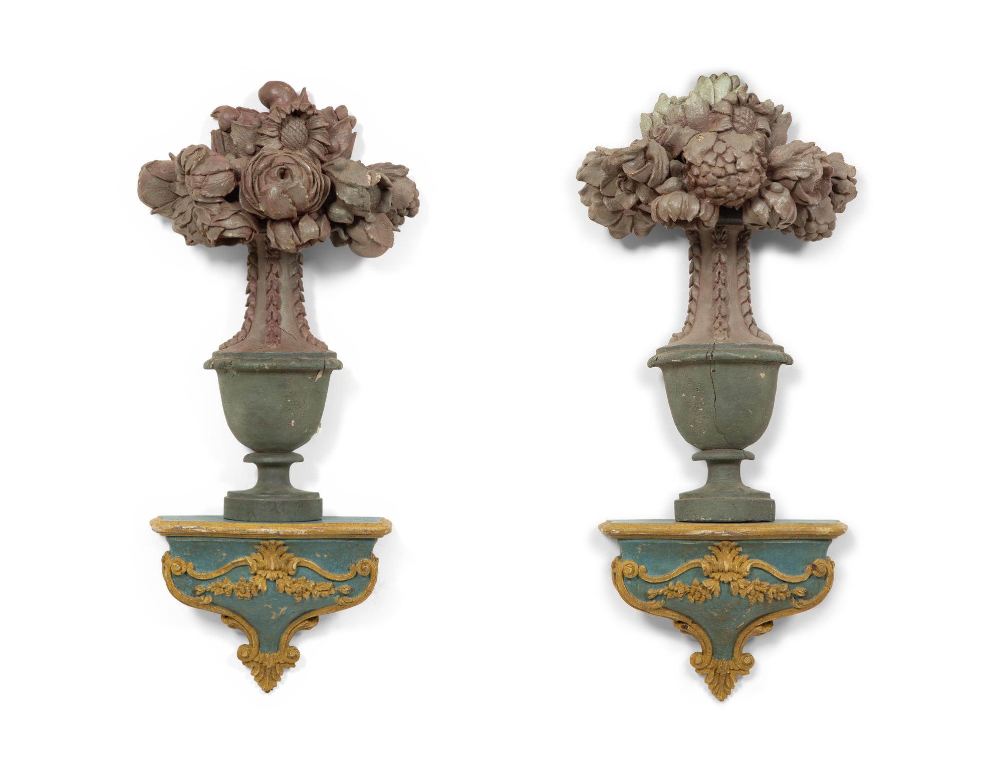 A Pair of Italian Painted and Parcel Gilt Flower Filled Urns and Wall Brackets