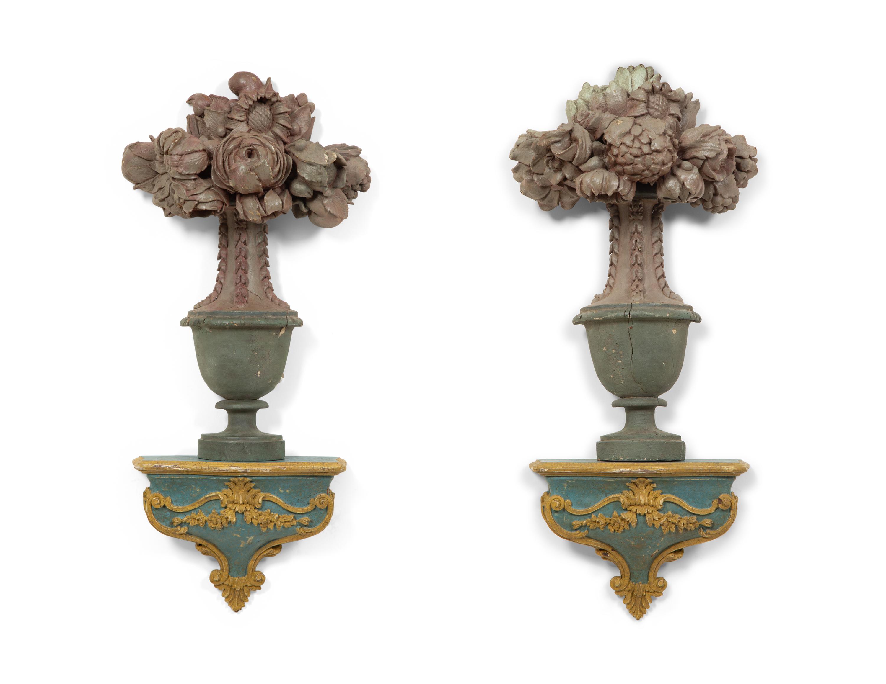 A Pair of Italian Painted and Parcel Gilt Flower Filled Urns and Wall Brackets