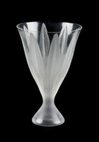 A Lalique Molded and Frosted Glass Cup Height 6 1/4 inches.
