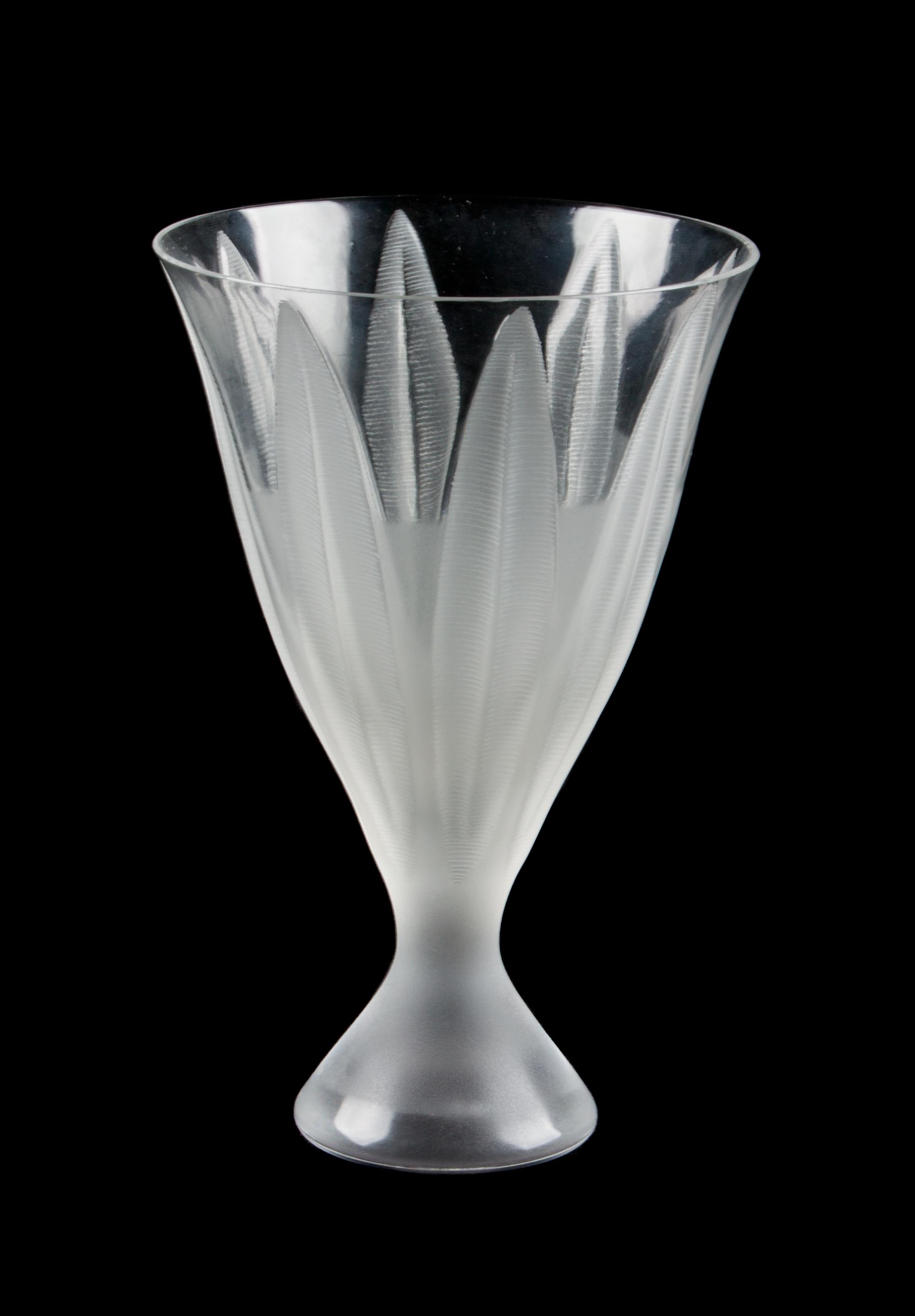 A Lalique Molded and Frosted Glass Cup Height 6 1/4 inches.