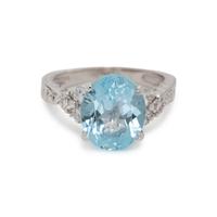BLUE TOPAZ AND DIAMOND RING