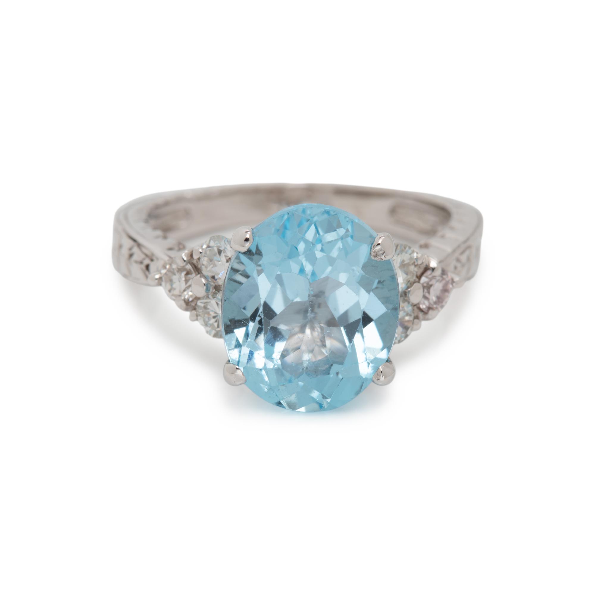 BLUE TOPAZ AND DIAMOND RING