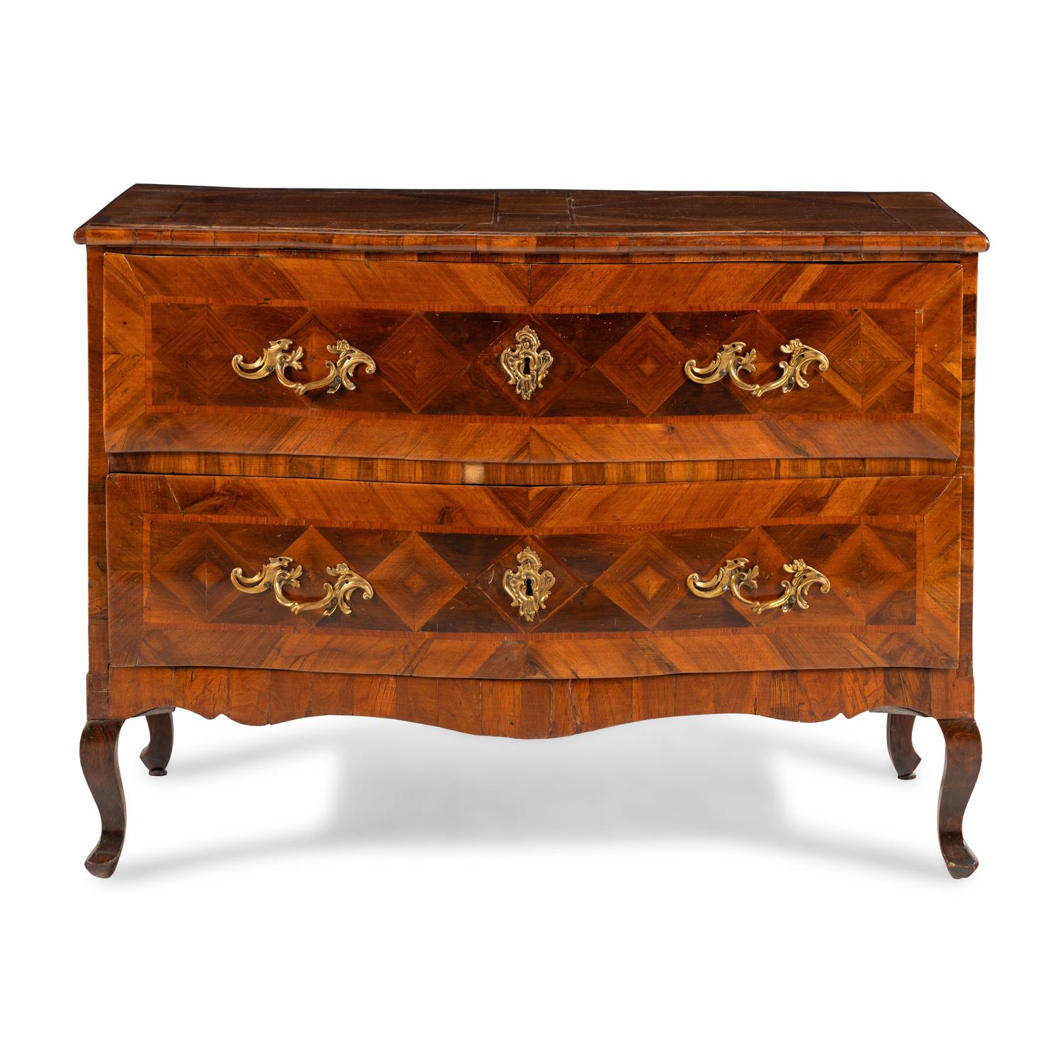 A Continental Parquetry Chest of Drawers
