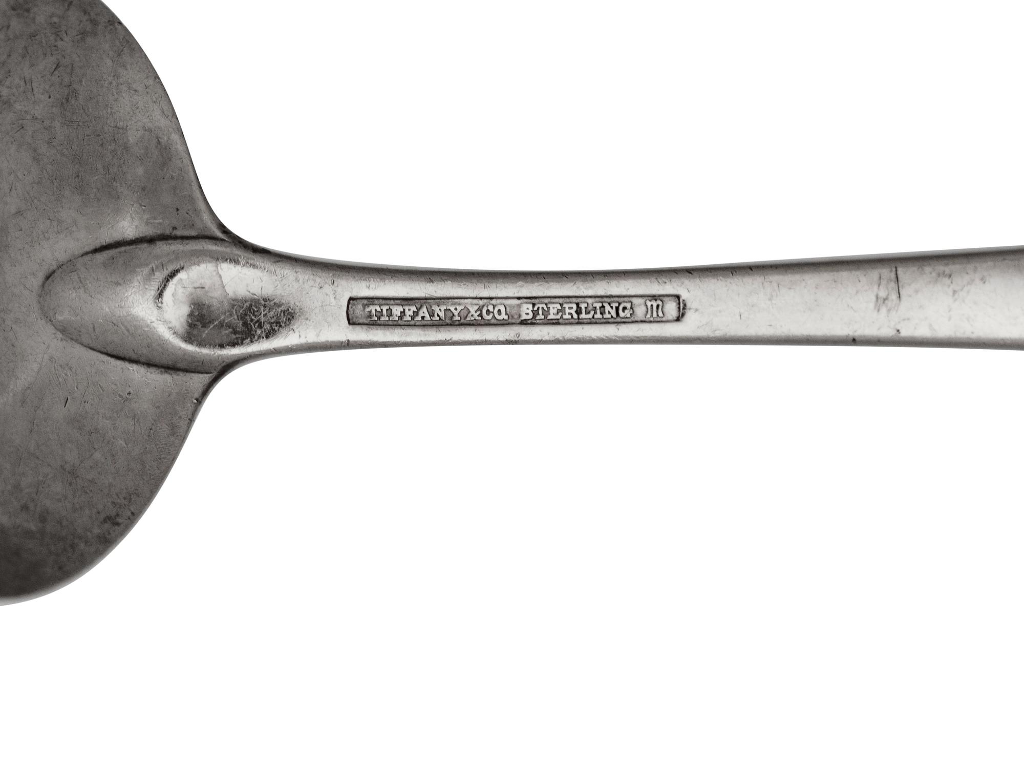 A Tiffany & Co. Silver Chrysanthemum Straining Ladle