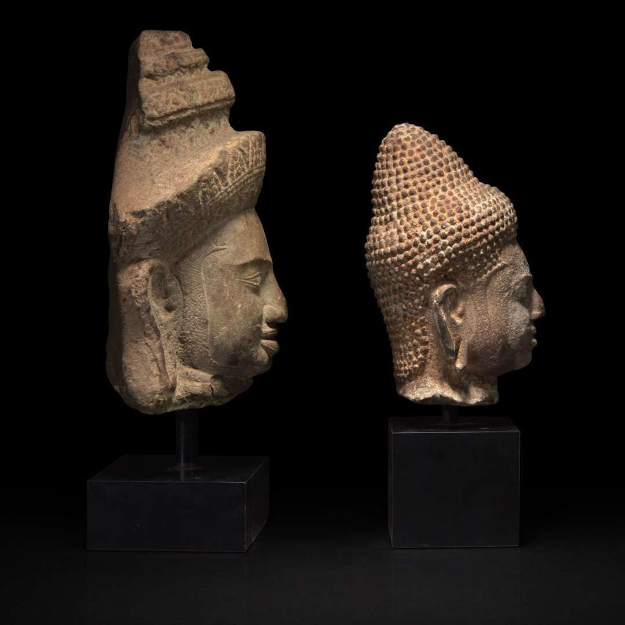 Two Khmer style carved stone heads 高棉风格石雕佛首两件