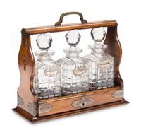 An English Oak and Cut Glass Tantalus