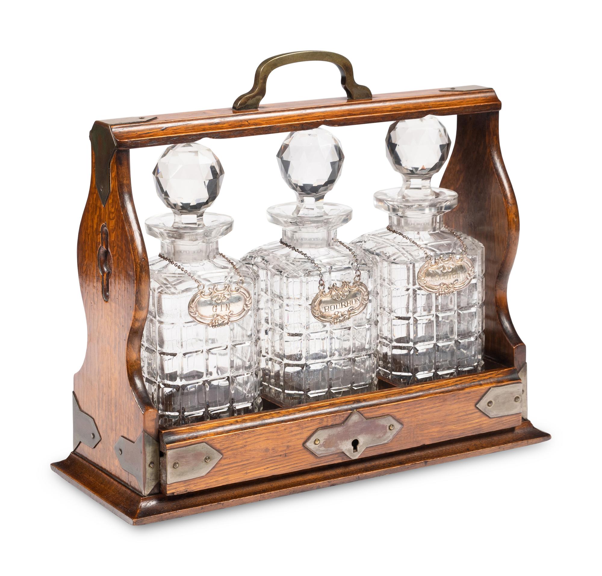 An English Oak and Cut Glass Tantalus