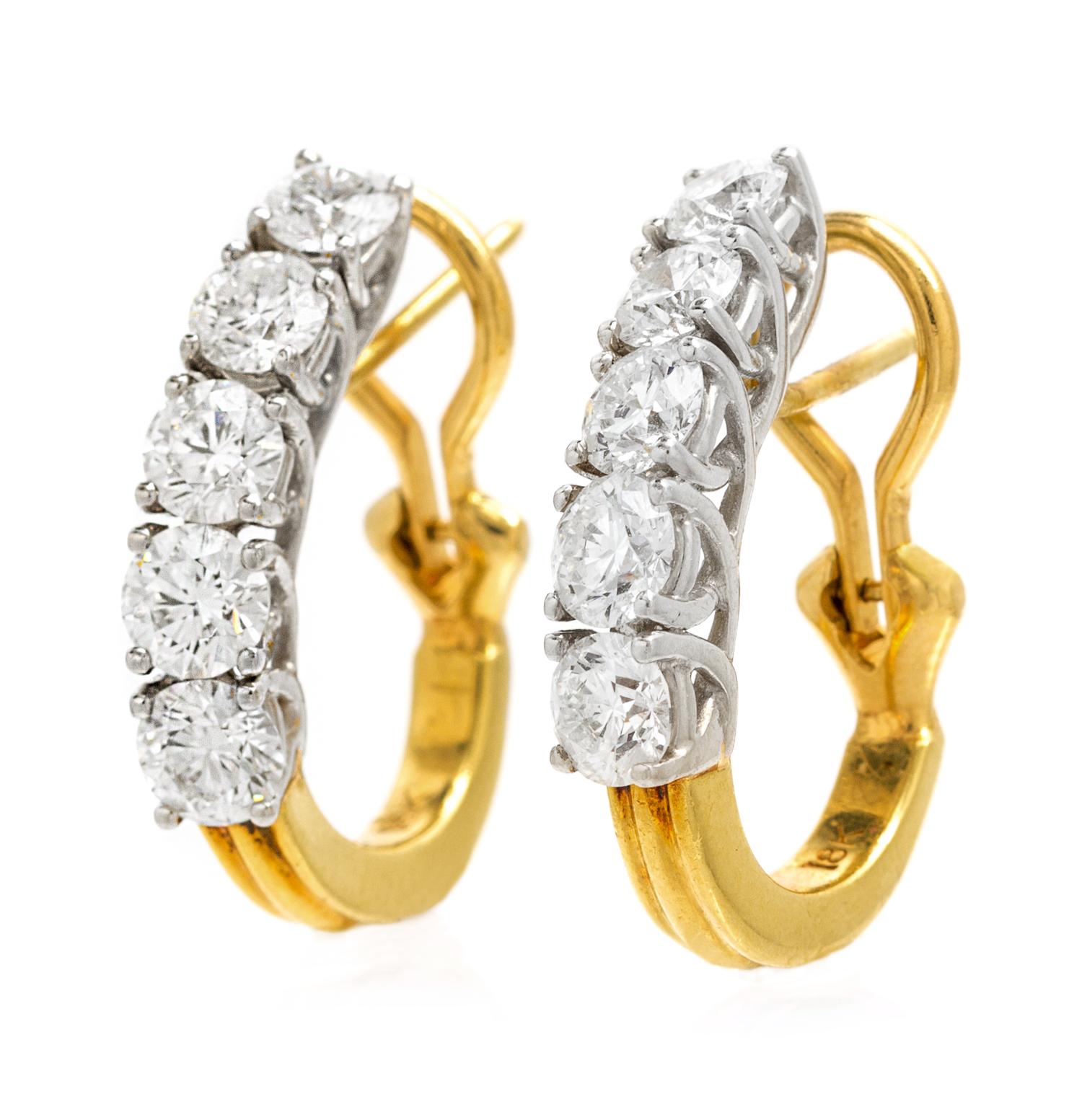 A Pair of Platinum, 18 Karat Yellow Gold and Diamond Earclips, 5.90 dwts.