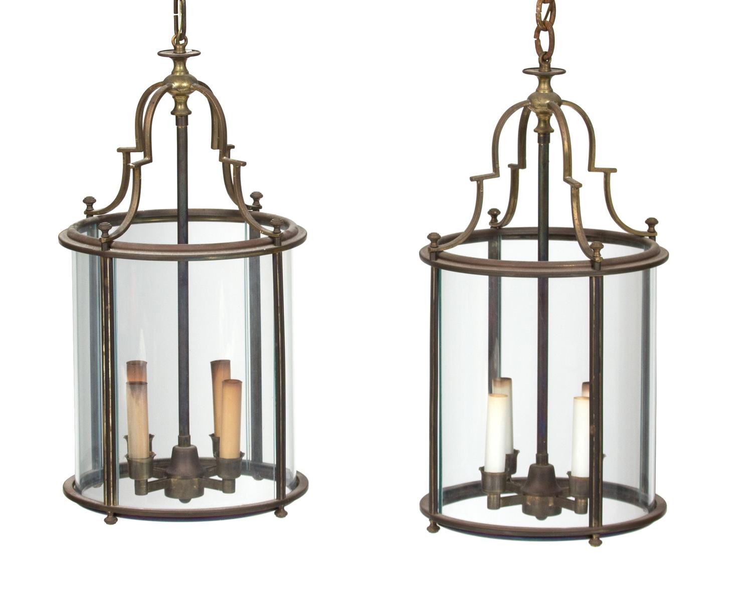 A Pair of French Brass and Glass Circular Hall Lanterns Height 21 x diameter 11 inches. — 20TH CENTURY