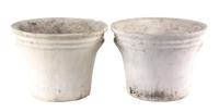 A Group of 6 Concrete Planters Height of largest 13 1/2 inches x depth 16 1/2 inches.