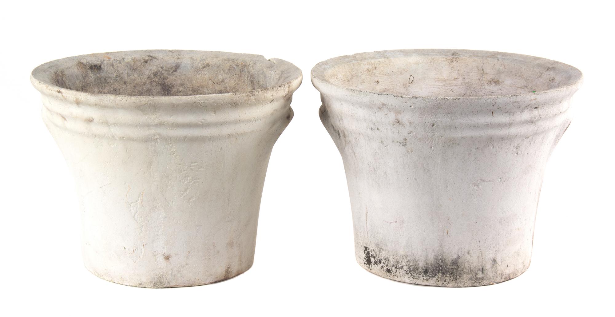 A Group of 6 Concrete Planters Height of largest 13 1/2 inches x depth 16 1/2 inches.