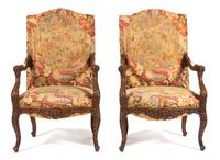 Three French Needlepoint Upholstered Fauteuils Height of taller 45 inches. — 19TH CENTURY