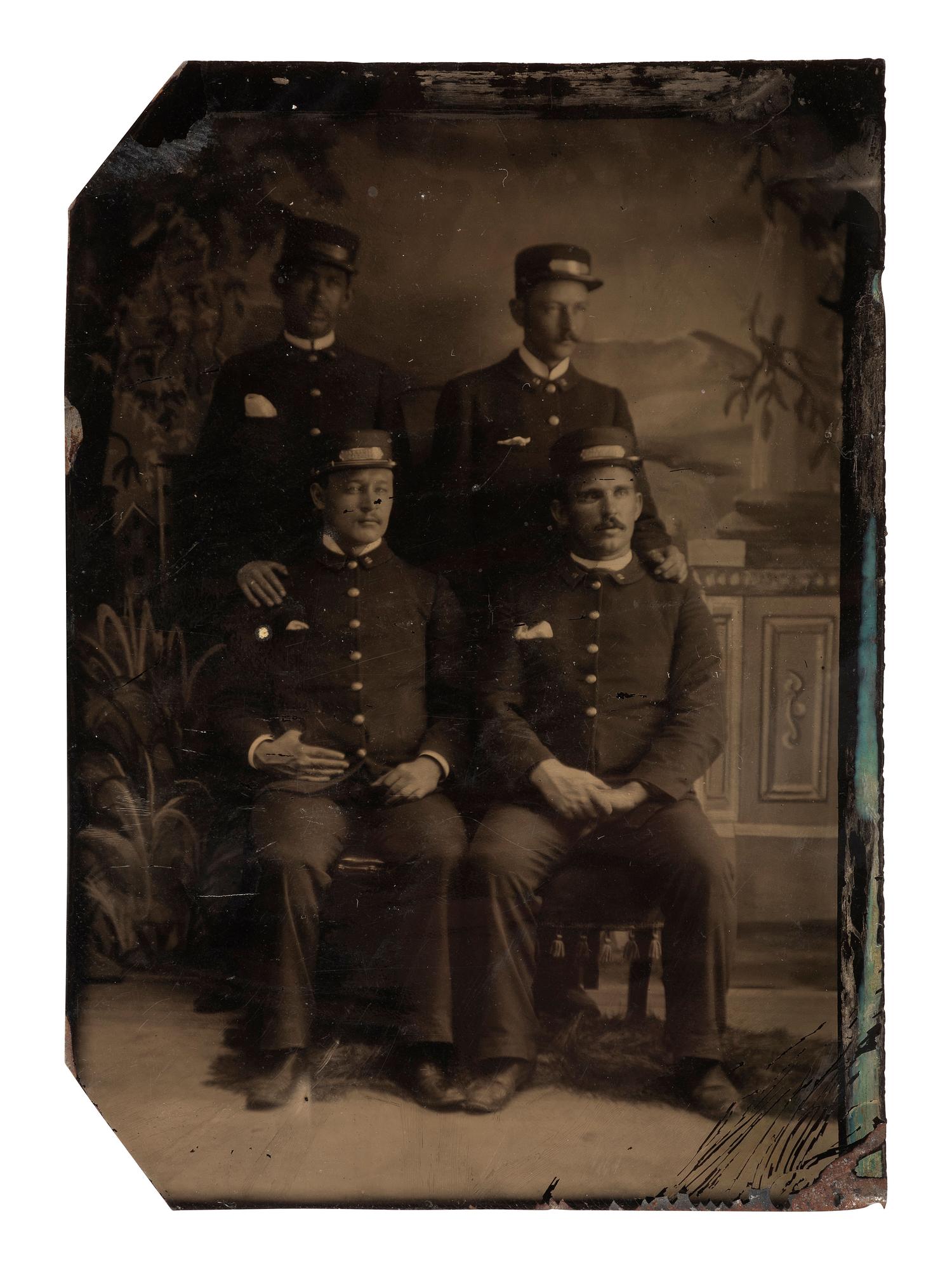 [AFRICAN AMERICANA]. 4 occupational photographs ft. African American subjects wearing uniforms.