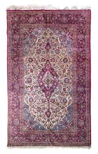 A Persian Kashan Silk and Wool Rug, 6 feet 11 inches x 4 feet 5 inches.