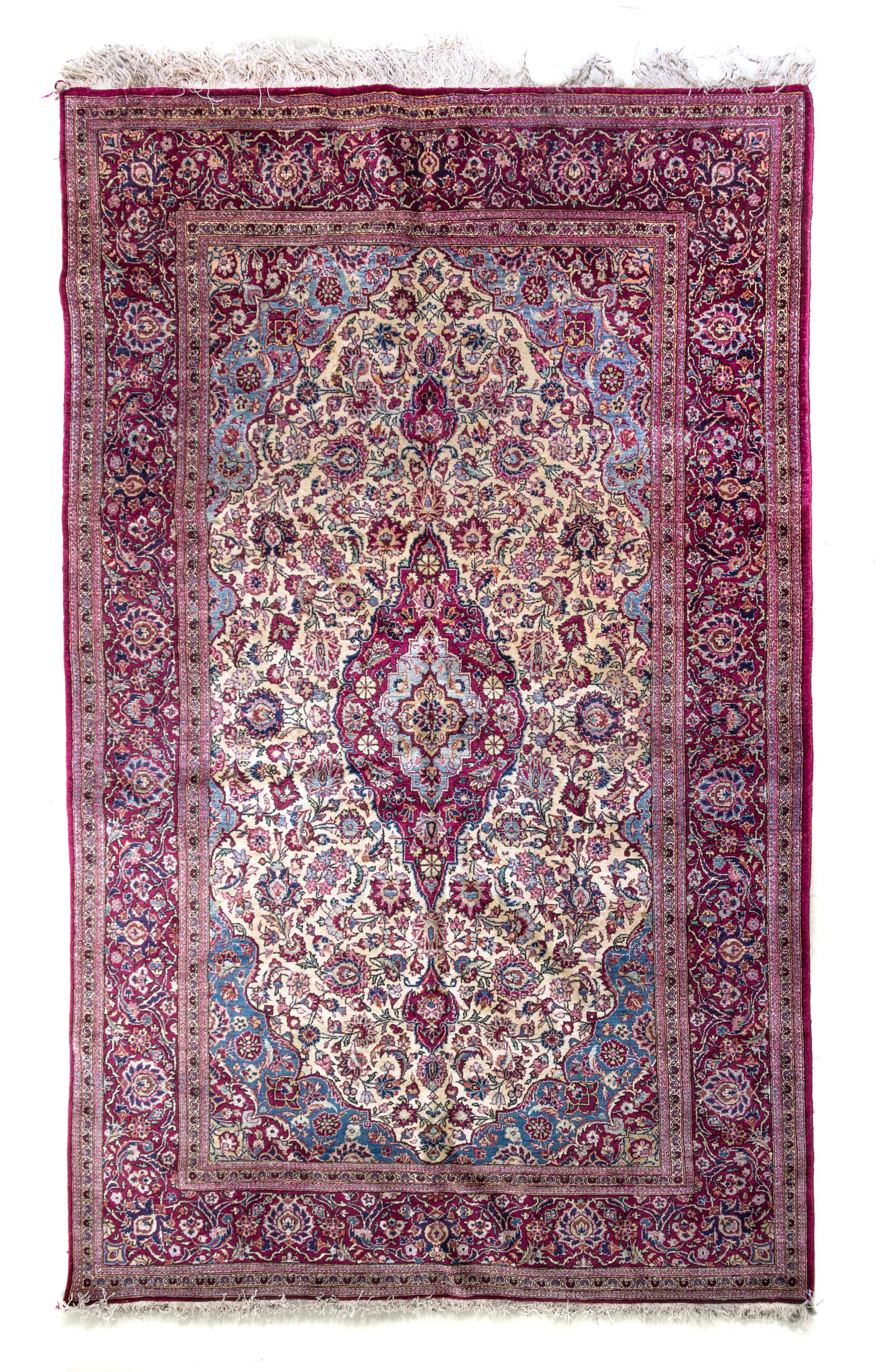 A Persian Kashan Silk and Wool Rug, 6 feet 11 inches x 4 feet 5 inches.