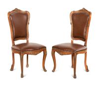 A Set of Four Louis XV Style Gilt Bronze Mounted Dining Chairs