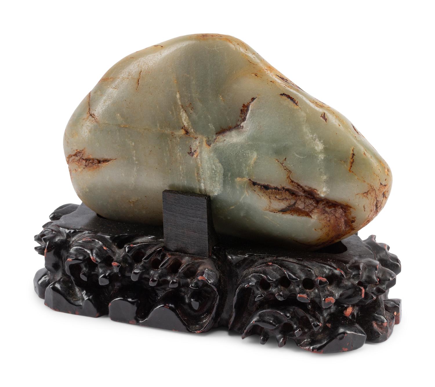A Chinese Carved Hardstone Figural Group on a Wood Base