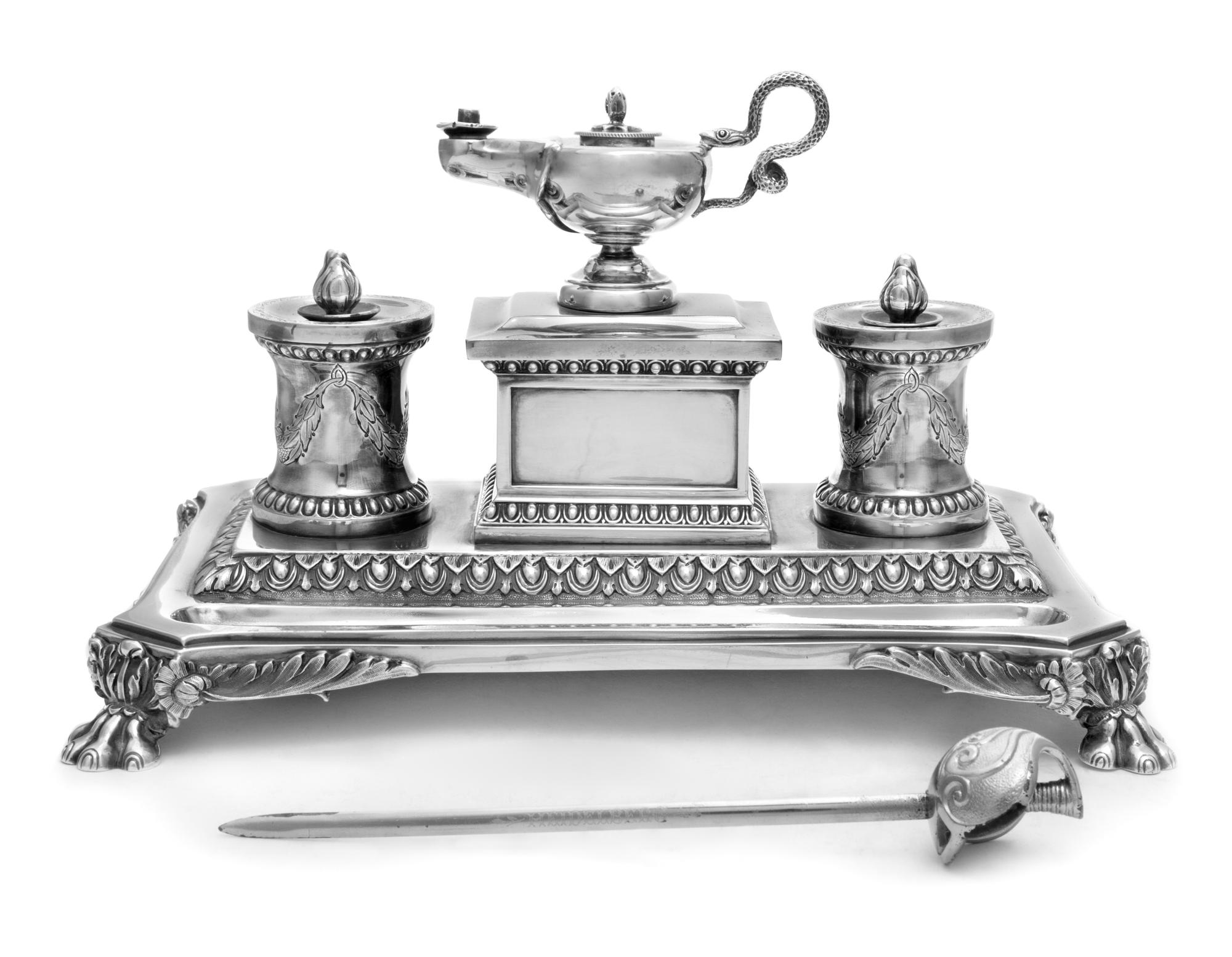 A Victorian Silver Standish, John Brashier for Henry Wilkinson & Co., London, 1882, having two foliate swag decorated ink pots flanking