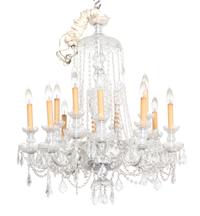 A Cut Glass Twelve Light Chandelier Height 35 to top of first hanger x diameter 27 inches. — 20TH CENTURY