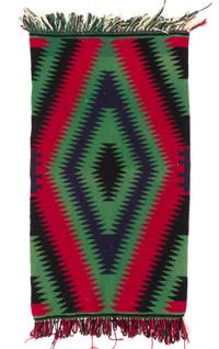 A Navajo Germantown 36 x 19 1/4 inches.