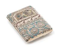 A Russian Enameled Silver Cigarette Case, Mark of D.P. Nikitin, Moscow, late 19th century, the lid with an enameled cartouche depicting