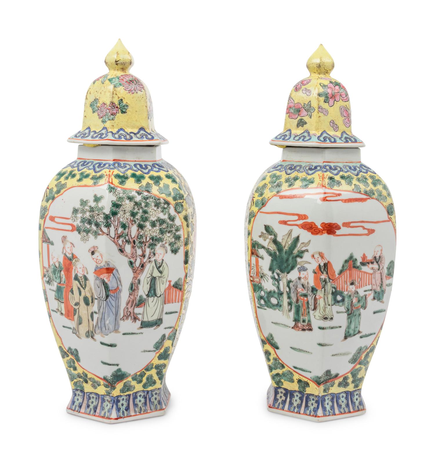 A Pair of Chinese Yellow Ground Famille Rose Hexagonal Vases and Covers