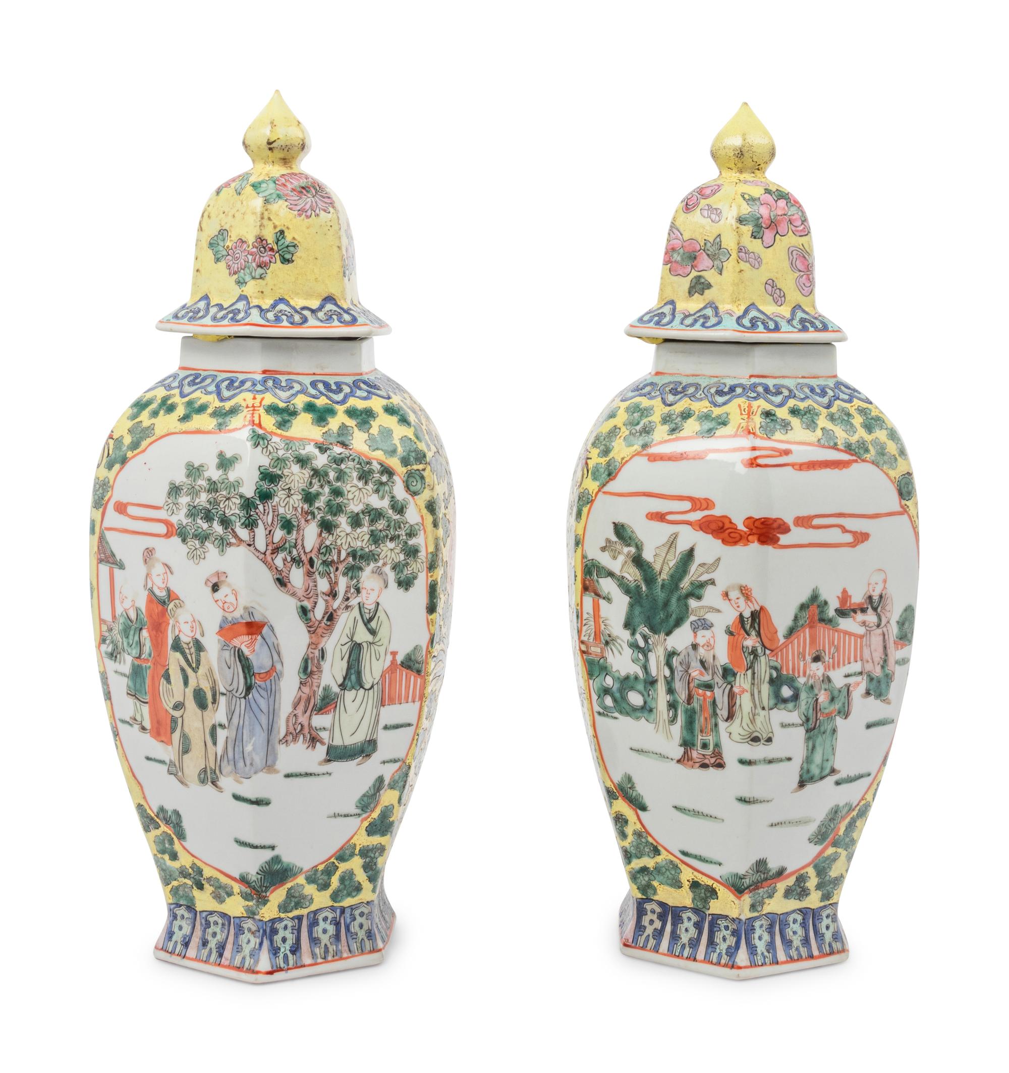 A Pair of Chinese Yellow Ground Famille Rose Hexagonal Vases and Covers