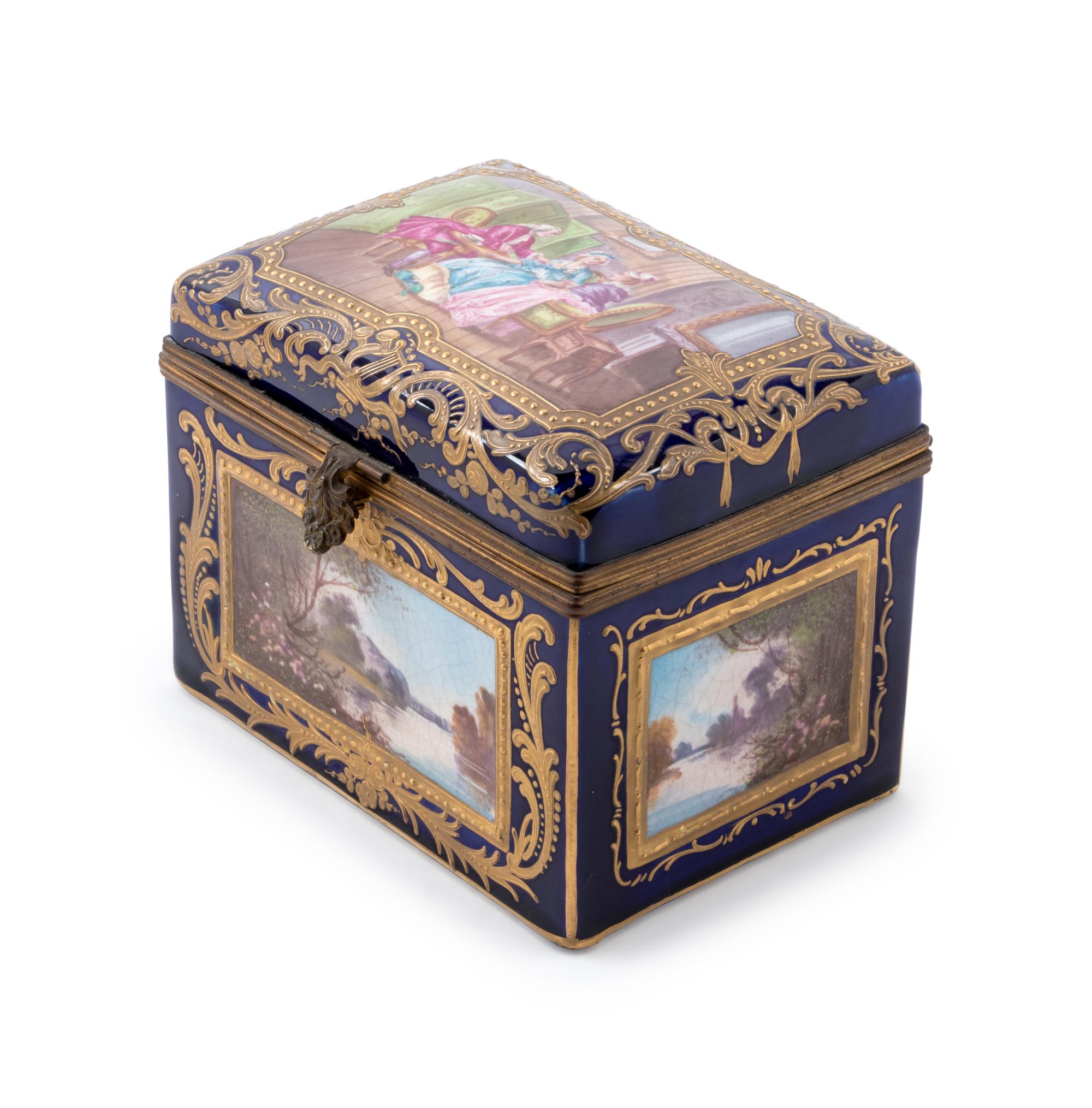 A Sèvres Style Painted and Parcel Gilt Porcelain Table Casket