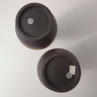 A Pair of Wedgwood Black Basaltes (Basalt) Encaustic-Decorated Handled Vases UK, circa 1800
