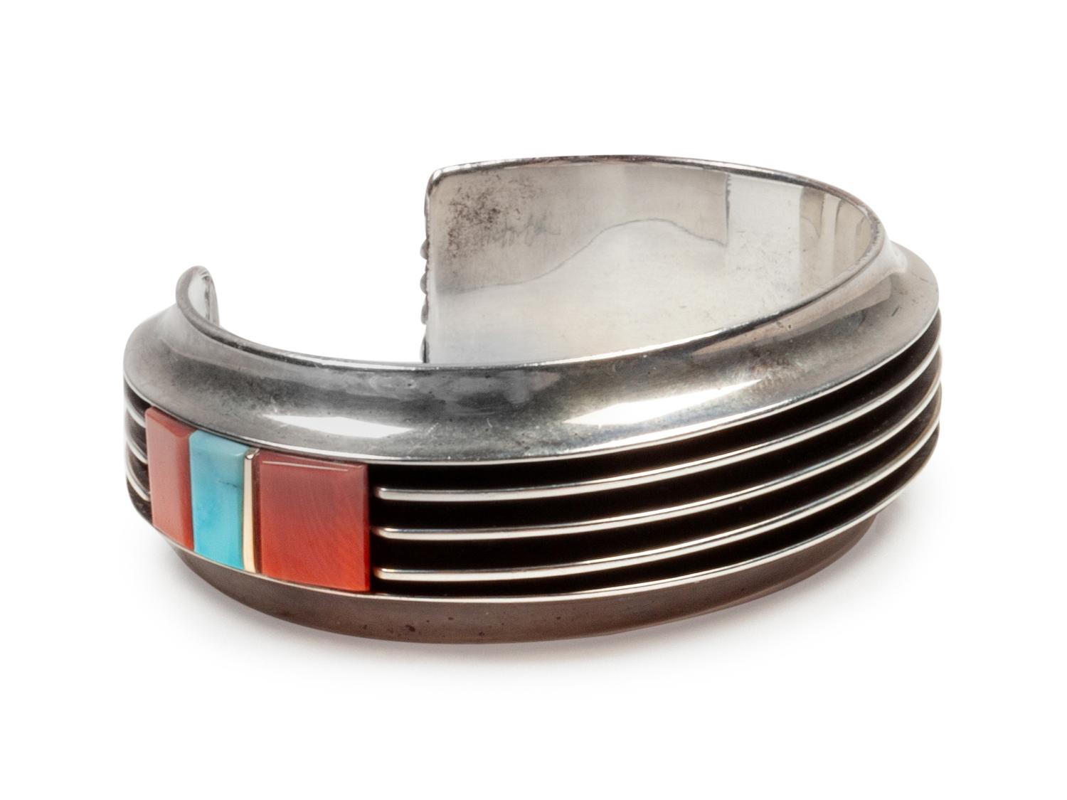 Sterling silver cuff bracelet with coral and turquoise inlay
