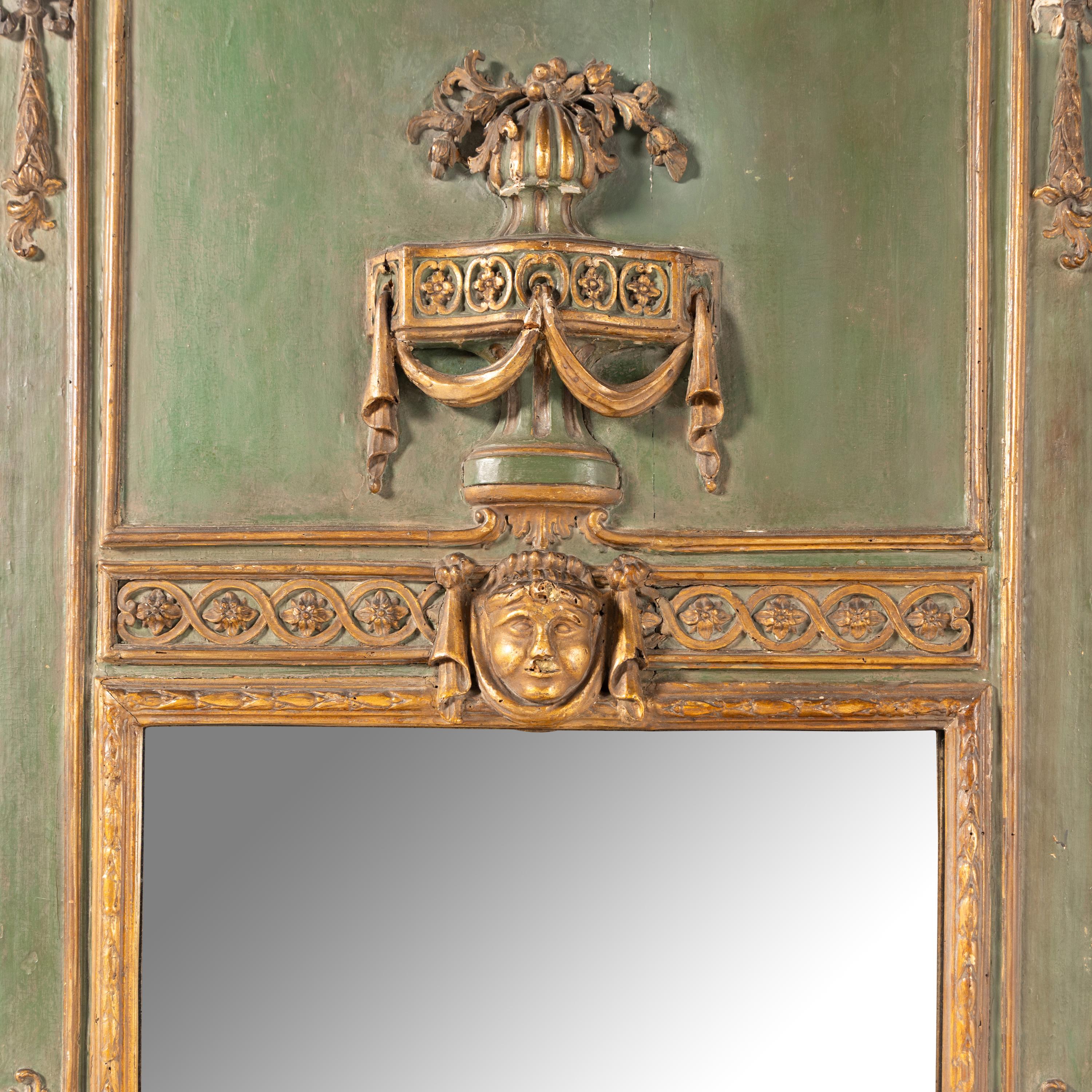A Louis XVI Style Painted and Parcel Gilt Trumeau Mirror