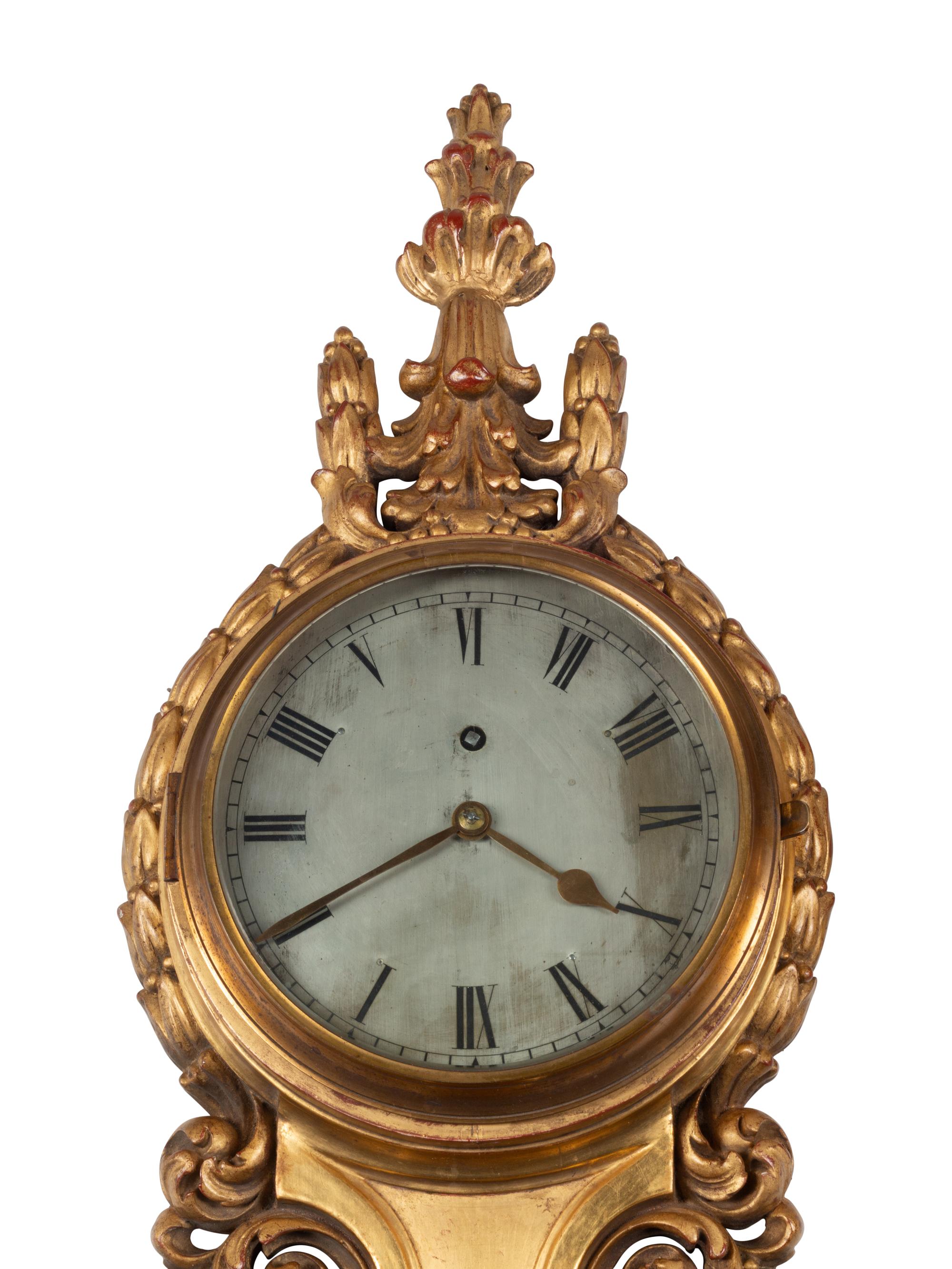 A French Carved Giltwood Clock and Barometer