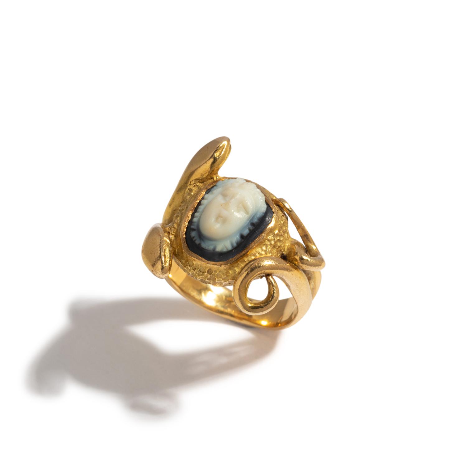 A Roman Onyx Cameo with the Head of Medusa — Set in a gold ring