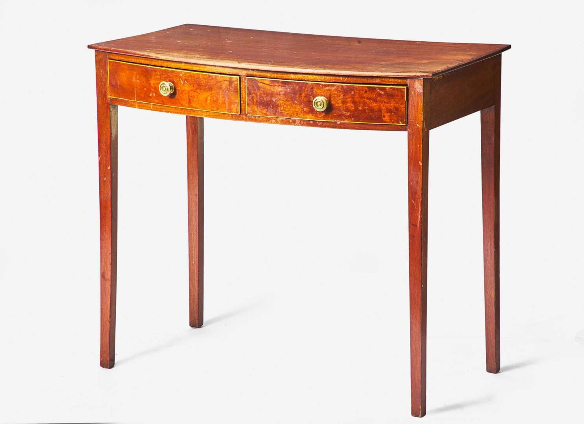 A George III bow-front inlaid mahogany serving table, circa 1790