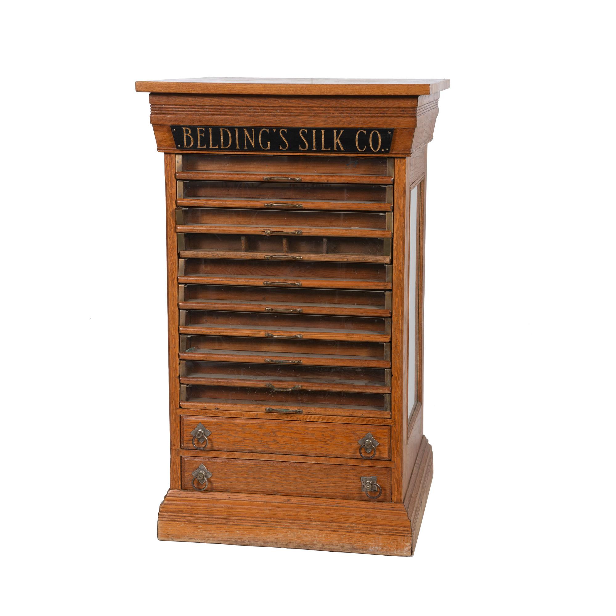 A Belding's Silk Co. Oak Spool Cabinet