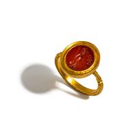 A Roman Gold and Carnelian Finger Ring with the Goddess Minerva Holding Nike