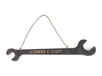 A Wrench-From Trade Sign and a Harness Maker Trade Sign